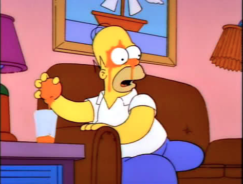Homer Simpson making OJ the old fashioned way
